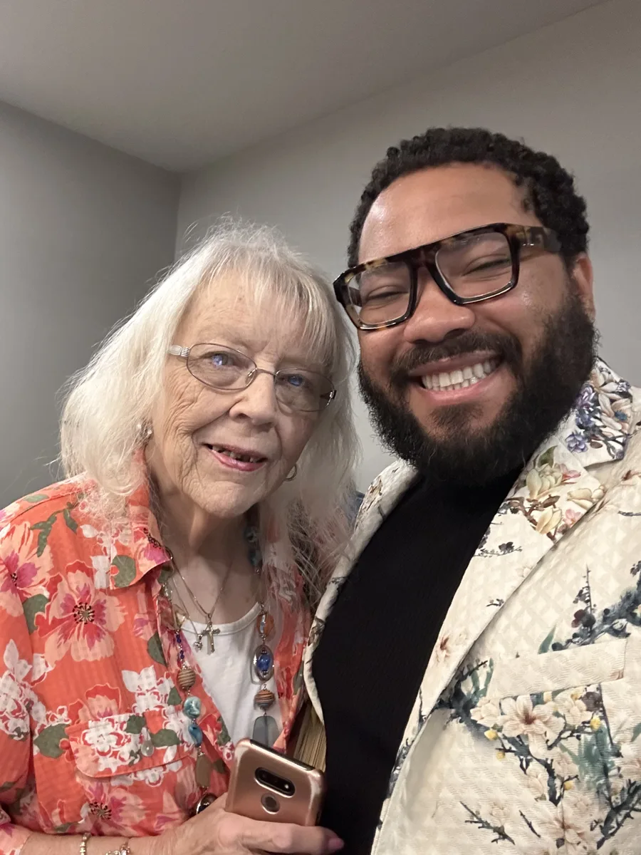 Chef with guests at dinner